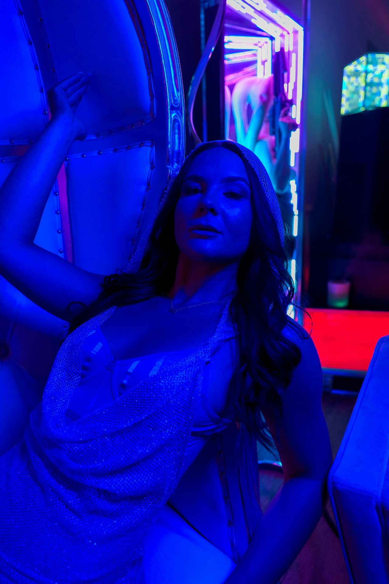 Blue-lit lounge moment